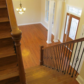 Two Story Entry Foyer And Dining Room Viewed From Stair Landing