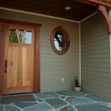 Unique front entry door and accent window