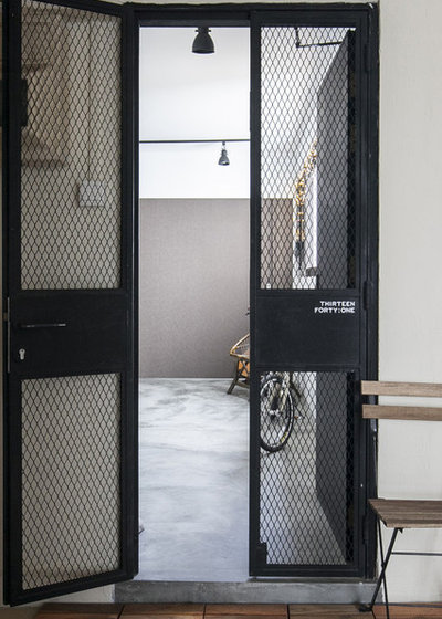 Industrial Entrance by The Design Abode