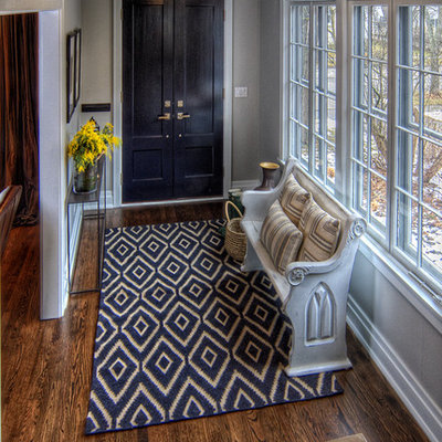 Elegant foyer photo in Chicago with gray walls