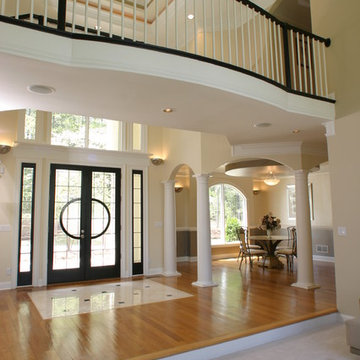 View of Foyer and Dining room of LAURIE house plan featured on Fine Living TV