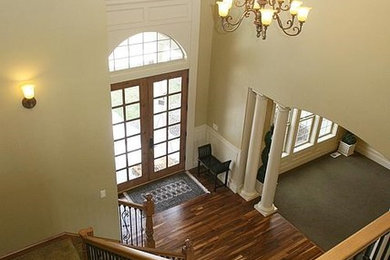 Example of a mid-sized tuscan staircase design in Portland