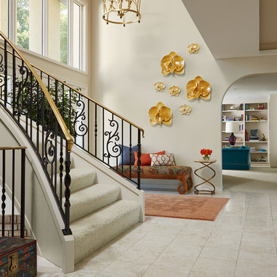 Large eclectic marble floor foyer photo in Minneapolis with beige walls