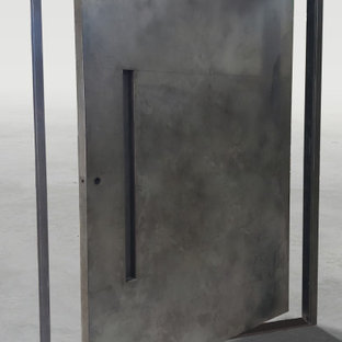 Weathered Black Stainless Steel Pivot Door