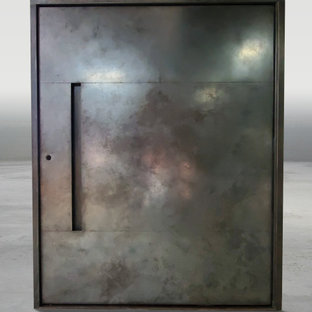 Weathered Black Stainless Steel Pivot Door