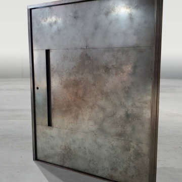 Weathered Black Stainless Steel Pivot Door