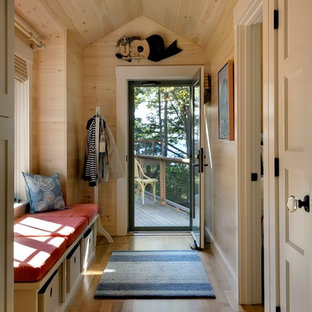 Inspiration for a coastal mudroom remodel in Portland Maine with beige walls
