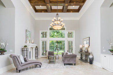 Large minimalist foyer photo in Atlanta with gray walls