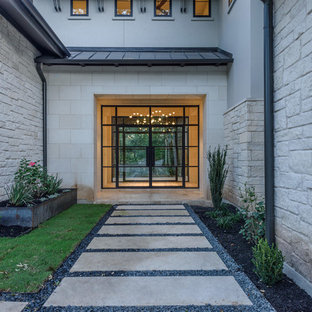 Entryway - contemporary entryway idea in Austin with white walls and a glass front door
