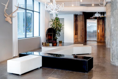 Inspiration for a modern concrete floor foyer remodel in New York