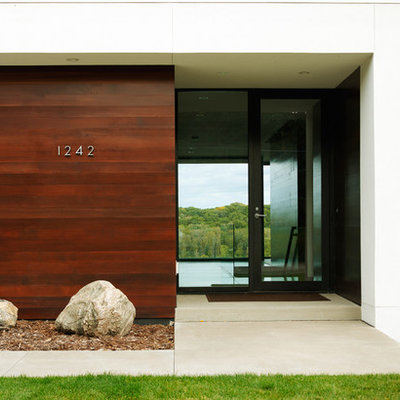 Entryway - modern entryway idea in Minneapolis with a glass front door