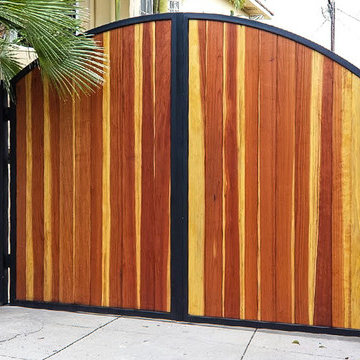 Wood entry and driveway gates, iron braced