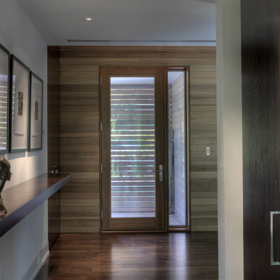 Inspiration for a contemporary entryway remodel in Baltimore with a glass front door