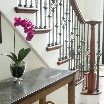Wrought Iron Staircase Railing Entryway with Nearly Natural Phalaenopsis Arrange