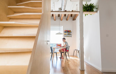 Casas Houzz: Una escalera transforma un ático con vistas a Madrid