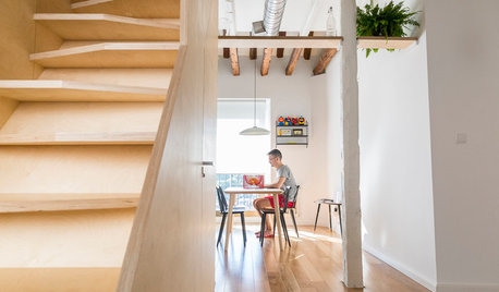 Casas Houzz: Una escalera transforma un ático con vistas a Madrid
