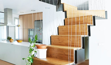 En detalle: Una escalera de madera que articula una casa
