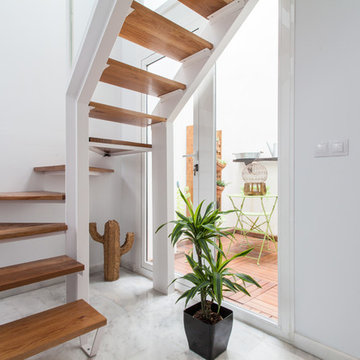 Rehabilitación apartamento doble altura con patio