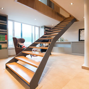 Foto de escalera recta, contemporánea, de tamaño medio, sin contrahuella, con escalones de madera