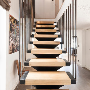 Idées déco pour un escalier sans contremarche droit scandinave de taille moyenne avec des marches en bois.