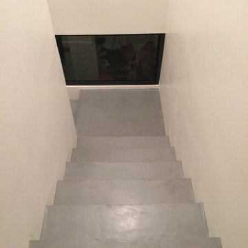 Escalier en béton ciré gris graphite