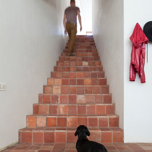 Idee per una scala industriale con pedata in terracotta e alzata in terracotta