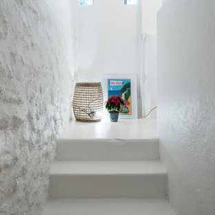 Idée de décoration pour un grand escalier nordique en L.