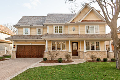 Inspiration for a timeless wood exterior home remodel in Chicago