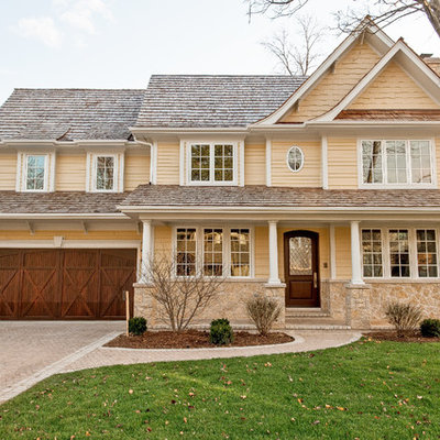 Inspiration for a timeless wood exterior home remodel in Chicago