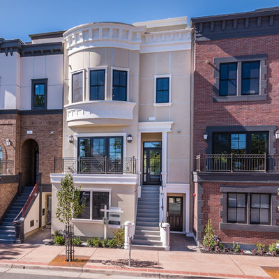 Large traditional multicolored three-story mixed siding townhouse exterior idea in San Luis Obispo