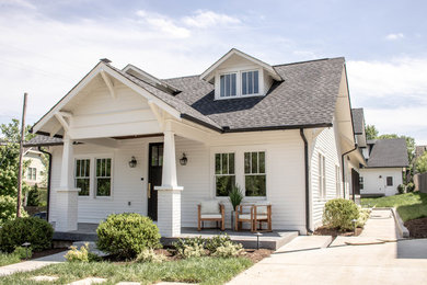 Inspiration for a craftsman white exterior home remodel in Nashville with a shingle roof
