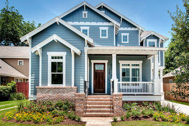 Example of an arts and crafts exterior home design in Houston