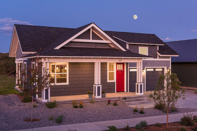 Example of a transitional house exterior design in Other with a shingle roof