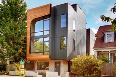シアトルにあるコンテンポラリースタイルのおしゃれな二階建ての家の写真