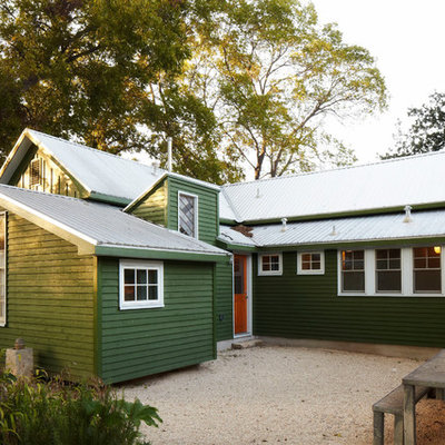 Farmhouse green exterior home photo in Austin