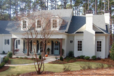 Example of a transitional exterior home design in Raleigh