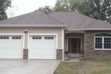 Example of an exterior home design in Other