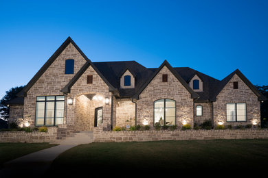 Example of a transitional exterior home design in Other