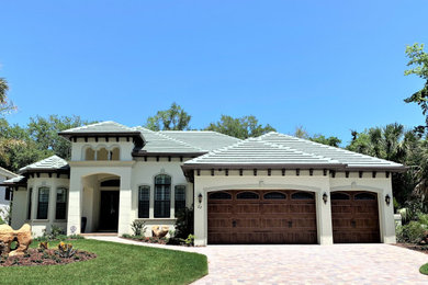 Mediterranean exterior home idea in Orlando