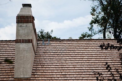 Inspiration for a large timeless gable roof remodel in Philadelphia