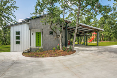Example of a mid-sized minimalist exterior home design in Dallas
