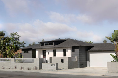 Large modern gray two-story concrete fiberboard exterior home idea in San Diego