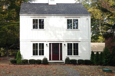 Example of a large transitional exterior home design in New York