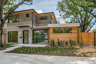 Design ideas for a contemporary house exterior in Dallas.