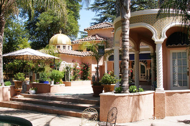 Mediterranean stucco exterior home idea in Sacramento
