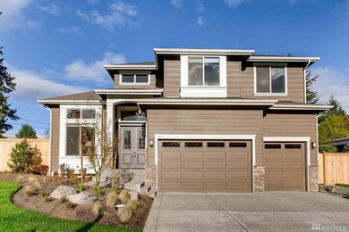 Inspiration for a large transitional brown house exterior remodel in Seattle