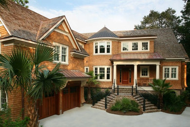 Craftsman brown wood exterior home idea in Charleston