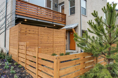 Example of a mid-sized trendy gray three-story mixed siding exterior home design in Dallas