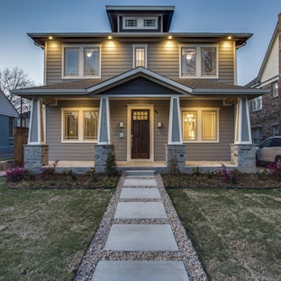 Arts and crafts gray two-story house exterior photo in Dallas with a hip roof and a shingle roof