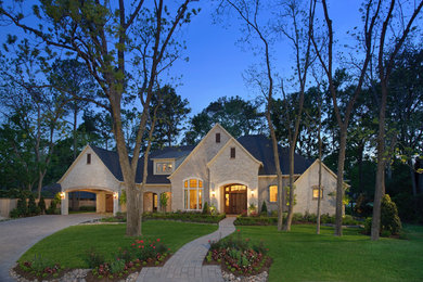Elegant stone exterior home photo in Houston